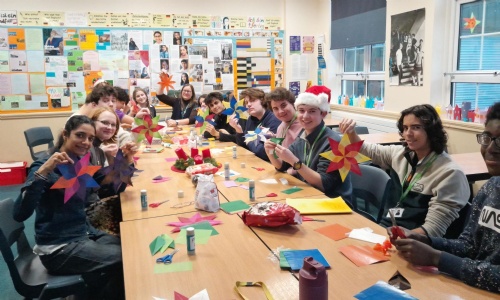 students doing paper craft 